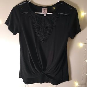 Self-esteem size extra small black T-shirt.